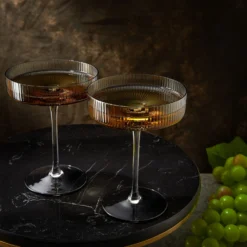 Ribbed Coupe Cocktail Glasses 8 Oz | Set Of 2 | Classic Manhattan Glasses For Cocktails, Champagne Coupe, Ripple Coupe Glasses, Art Deco Gatsby Vintage, Crystal With Stems (Smoke Grey) 11 Ribbed Coupe Cocktail Glasses 8 Oz | Set Of 2 | Classic Manhattan Glasses For Cocktails, Champagne Coupe, Ripple Coupe Glasses, Art Deco Gatsby Vintage, Crystal With Stems (Smoke Grey) -Refined Spirits Store 2022 11 23 A AEa 1972 3 scaled
