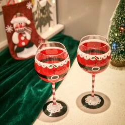 Santa's Elf Stemmed Wine & Water Glasses - Set Of 2 - Shining Red & Black, 9" H - Christmas & Holiday Parties Glassware - Xmas Tree - Set Of 2, 17.5oz - Santa Festive Glass - Great Gift! 8 Santa's Elf Stemmed Wine & Water Glasses - Set Of 2 - Shining Red & Black, 9" H - Christmas & Holiday Parties Glassware - Xmas Tree - Set Of 2, 17.5oz - Santa Festive Glass - Great Gift! -Refined Spirits Store 3 54