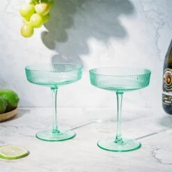 Ribbed Coupe Cocktail Glasses 8 Oz | Set Of 2 | Classic Manhattan Glasses For Cocktails, Champagne Coupe, Ripple Coupe Glasses, Art Deco Gatsby Vintage, Crystal With Stems (Green, Set Of 2) -Refined Spirits Store 51sBiOLMujL. AC