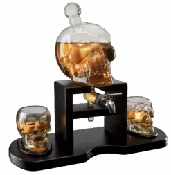 Skull Skeleton Wine & Whiskey Decanter Set 750 ML With 2 Skull 3oz Skeletons Shot Glasses + Mahogany Wooden Base & Pouring Spigot Decor Glass, Goth Spooky Drinking Glassware The Wine Savant