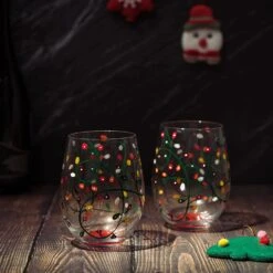 Themed Lights Stemless Wine & Water Glasses - Artisanal Hand Painted Ornament Light Bulbs Glasses - Xmas Tree - Set Of 2, 17.5oz - Santa Festive Theme Stemless Glass -Refined Spirits Store 8125jTS4t5L. AC SL1500