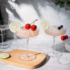 Ribbed Coupe Cocktail Glasses 8 Oz | Set Of 4 | Classic Manhattan Glasses For Cocktails, Champagne Coupe, Ripple Coupe Glasses, Art Deco Gatsby Vintage, Crystal With Stems (Clear) 14 Ribbed Coupe Cocktail Glasses 8 Oz | Set Of 4 | Classic Manhattan Glasses For Cocktails, Champagne Coupe, Ripple Coupe Glasses, Art Deco Gatsby Vintage, Crystal With Stems (Clear) -Refined Spirits Store 81JXv3HNWwL. AC SL1500