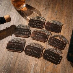 Decanter Tags Copper Set Of 8 For Alcohol - The Wine Savant - Bottle - Whiskey, Scotch, Bourbon, Gin, Rum, Vodka, Tequila And Brandy, Fits All Bottles, Great Home Gift, Gifts For Men & Women 3" L 2"H -Refined Spirits Store 91JEEIlLAML. AC SL1500 d7aaba94 34cb 432d 84ee d4825b8e149d