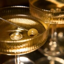 Ribbed Coupe Cocktail Glasses 8 Oz | Set Of 4 | Classic Manhattan Glasses For Cocktails, Champagne Coupe, Ripple Coupe Glasses, Art Deco Gatsby Vintage, Crystal With Stems (Clear) 17 Ribbed Coupe Cocktail Glasses 8 Oz | Set Of 4 | Classic Manhattan Glasses For Cocktails, Champagne Coupe, Ripple Coupe Glasses, Art Deco Gatsby Vintage, Crystal With Stems (Clear) -Refined Spirits Store Clear ribbed coupe glasses set of 4 3 2