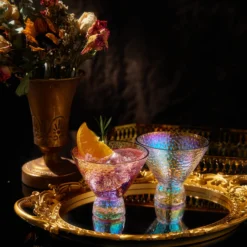 Iridescent Lustered Stemless Martini Glasses Set Of 2 - Hammered Cocktail & Martini Glasses - Luxury Gift Box - Gold Rim 8oz Colorful Stemless Glassware - Weddings, Anniversary, Christmas, Barware -Refined Spirits Store GoldRimIridescentHammeredstemlessmartiniSetof2lifestyle2 1 scaled