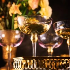 Colored Coupe Art Deco Glasses, Gold | Set Of 4 | 8 Oz Classic Cocktail Glassware For Champagne, Martini, Manhattan, Sidecar, Crystal Speakeasy Style Goblets Stems (Pink) 15 Colored Coupe Art Deco Glasses, Gold | Set Of 4 | 8 Oz Classic Cocktail Glassware For Champagne, Martini, Manhattan, Sidecar, Crystal Speakeasy Style Goblets Stems (Pink) -Refined Spirits Store Pink flower coupes set of 4 2 2