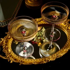 The Wine Savant Ribbed Coupe Cocktail Glasses 8 Oz | Set Of 2 | Classic Manhattan Glasses For Cocktails, Champagne Coupe, Ripple Coupe Glasses, Art Deco Gatsby Vintage, Crystal With Stems (Rose Pink) -Refined Spirits Store pink ribbed 1 1