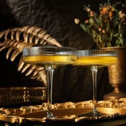 Ribbed Coupe Cocktail Glasses 8 Oz | Set Of 2 | Classic Manhattan Glasses For Cocktails, Champagne Coupe, Ripple Coupe Glasses, Art Deco Gatsby Vintage, Crystal With Stems (Smoke Grey) -Refined Spirits Store smoke grey ribbed 2 1